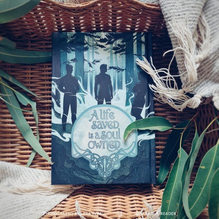 Scarlight special edition rear cover featuring forest artwork and quote “A life saved is a soul owned”